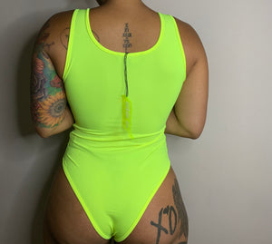 Neon yellow body suit