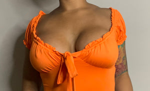 Orange short sleeve bodysuit